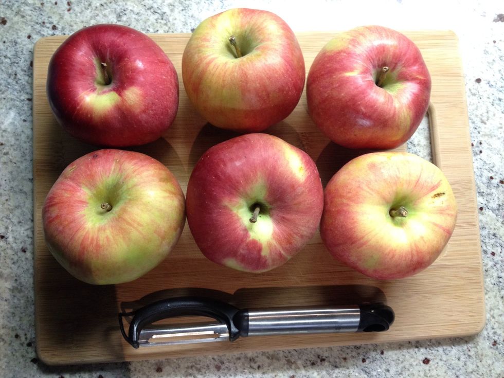 Peel and core 4-6 baking apples (depending on the size of your pie). Golden delicious or Macintosh apples work great - I like to use Northern Spy because they're not too sweet and not too sour.