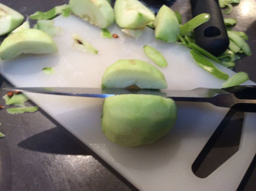 peel and cut apples into quarters