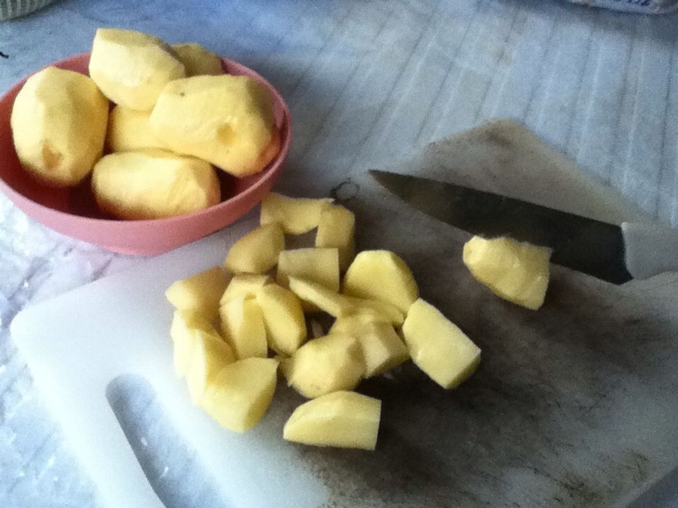Peel and cut potatoes into medium chunks.