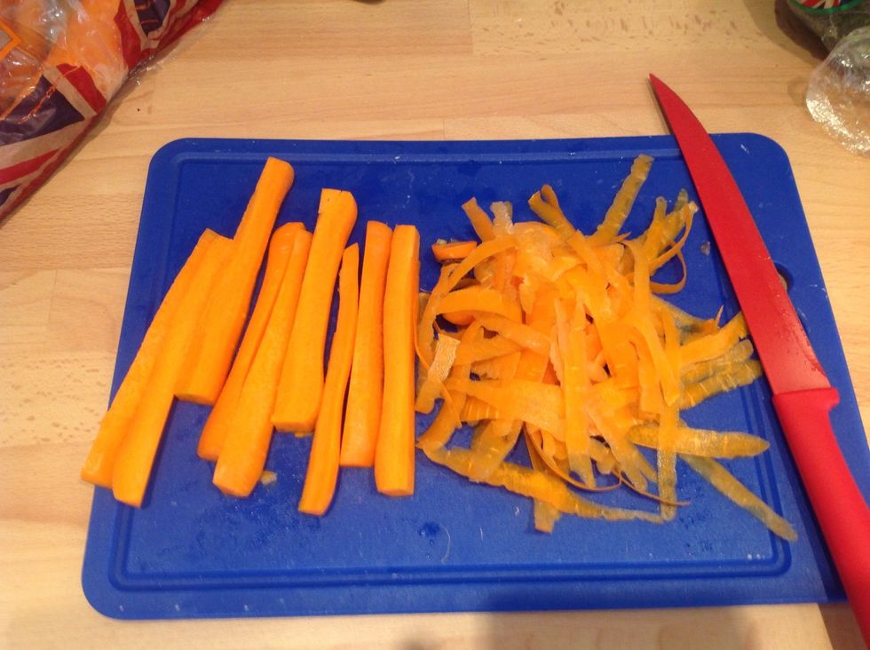 Peel and cut the carrots into long strips
