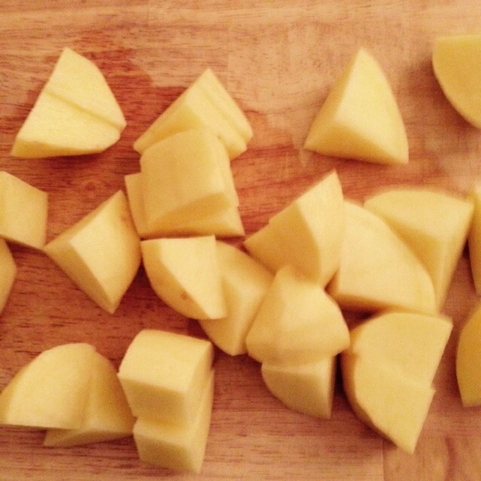 Peel and cut the potatoes into pieces
