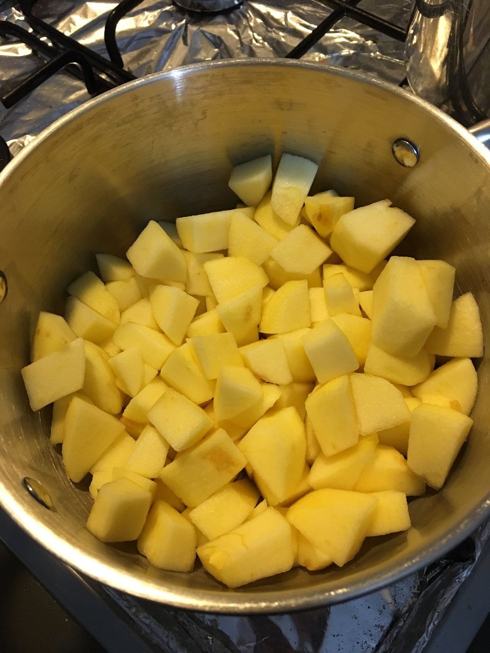 Peel and dice the apples, Add water & heat them up on low a flame