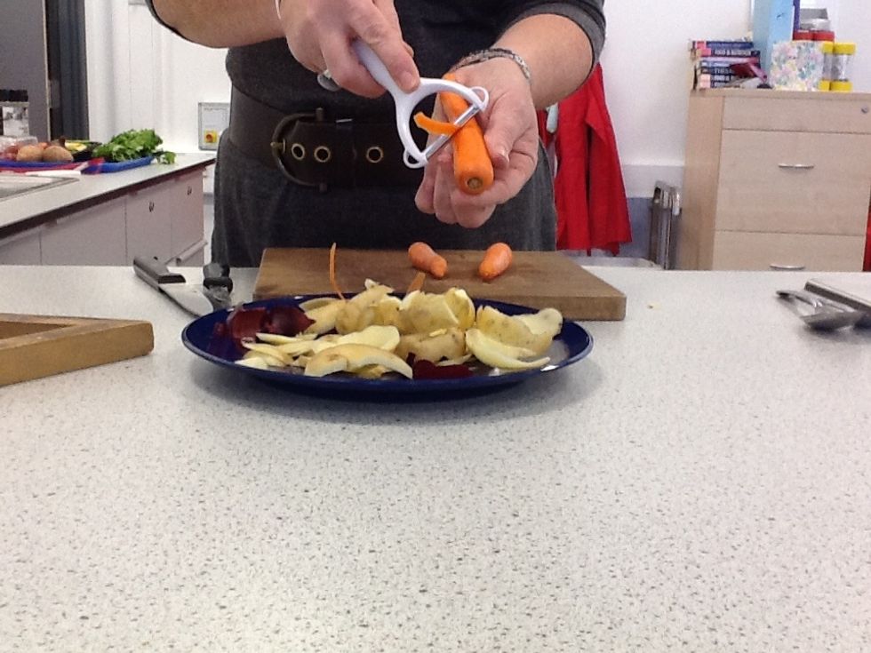 Peel and dice the carrots.