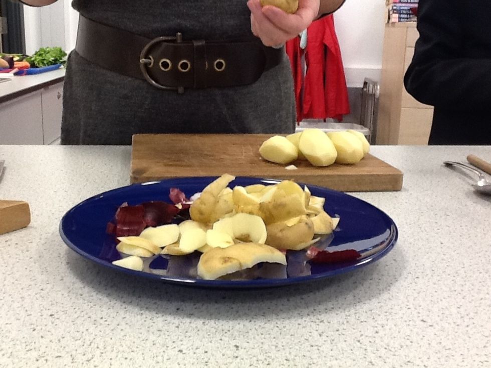 Peel and dice the potatoes.