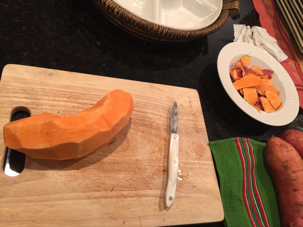 Peel and dice your sweet potatoes.