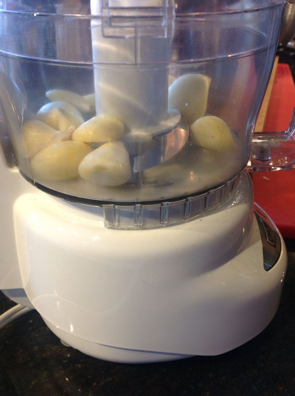 Peel and finely mince garlic cloves a mini-prep processor is a big help if you have one. About 6 pulse will do it.