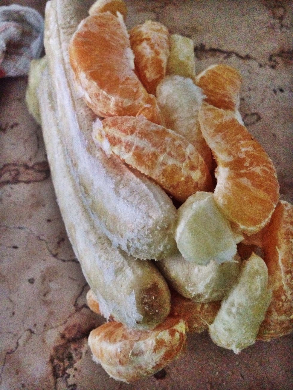 Peel and freeze 4 bananas, lemons and orange (peeled and separated in wedges)