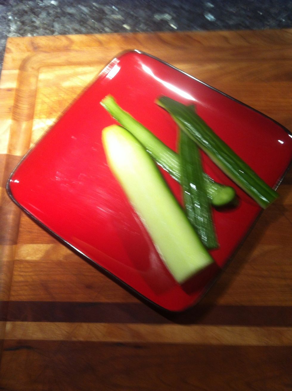 Peel and grate cucumber