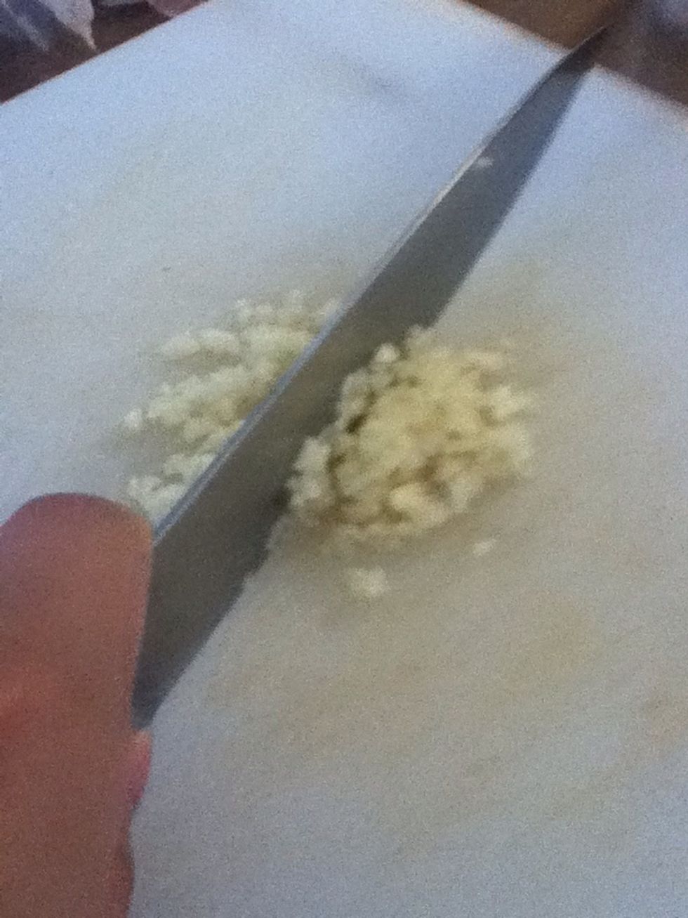 Peel and mince your garlic. If you want to save some time and have a jar of mined garlic already, you only need 1 tablespoon of it.