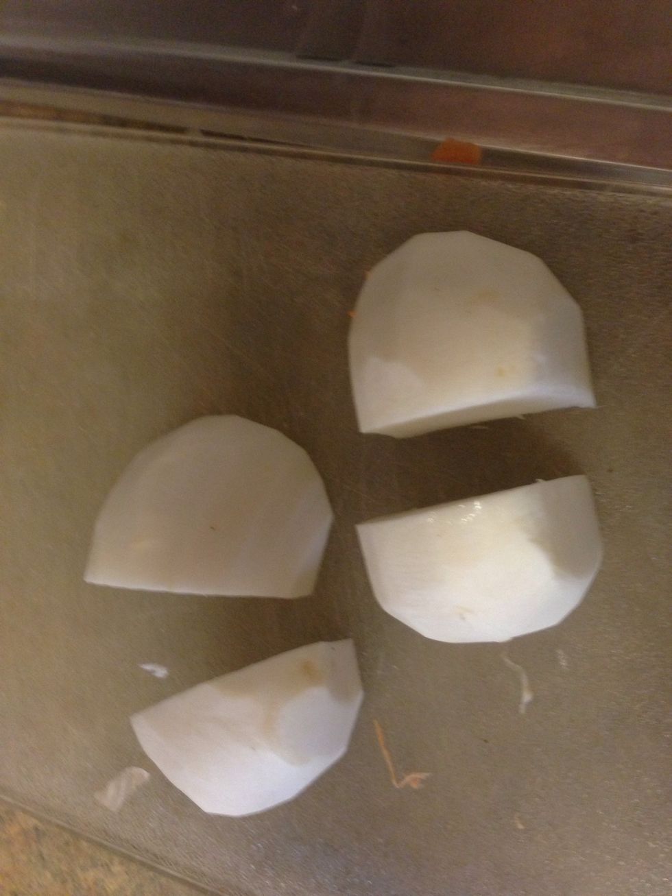 Peel and quarter turnip