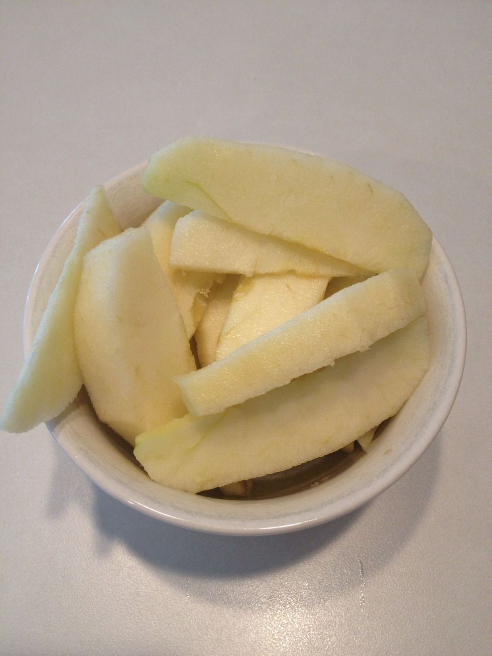 Peel and slice apples.