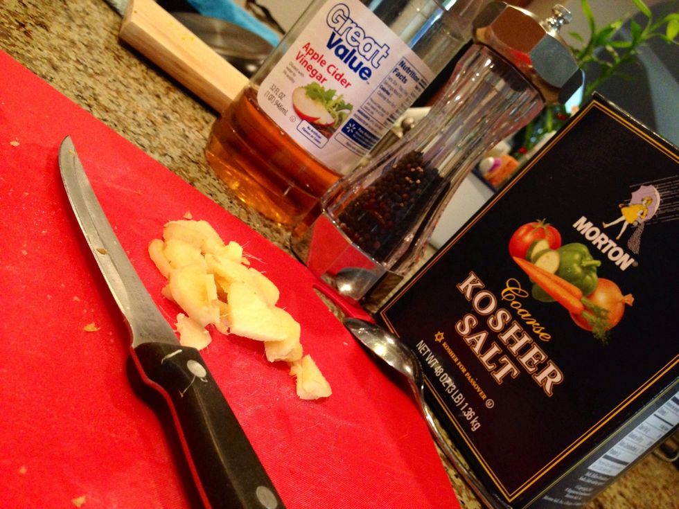 Peel and slice the Ginger. Grab your Apple Cider Vinegar, Salt, & Black Pepper.