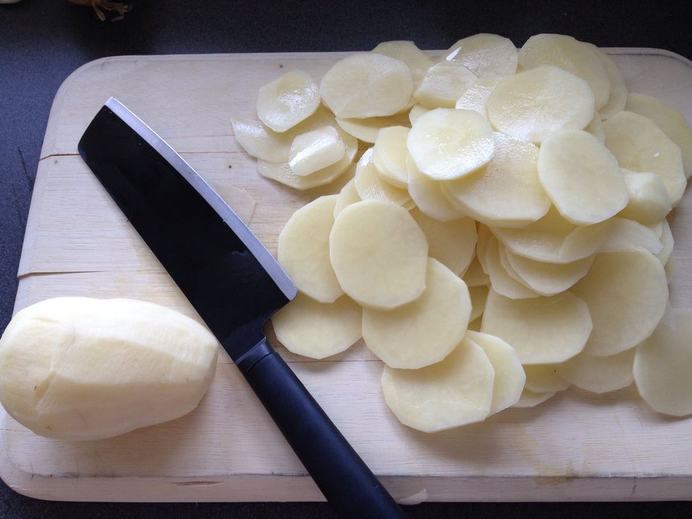 Peel and slice the potatoes. I use big potatoes, because it's faster to both peel and slice \ud83d\ude09