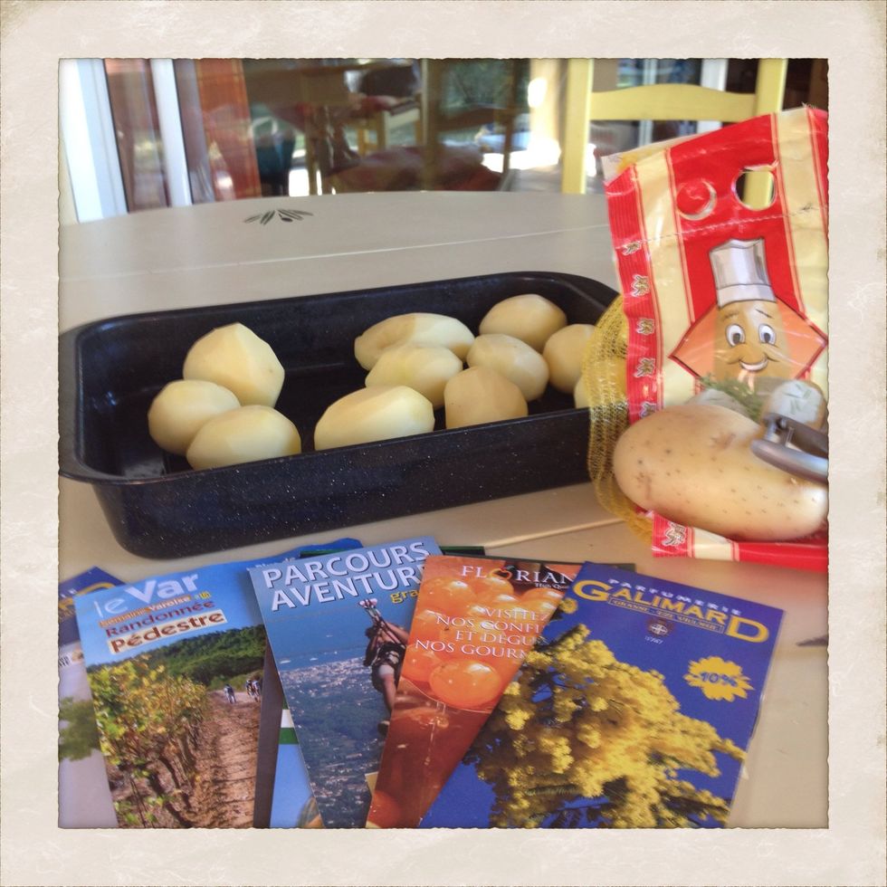 Peel and slice the potatoes. Pic is before slicing :-) Please enjoy the lovely tourist brochures added to let you share the feeling of vacation