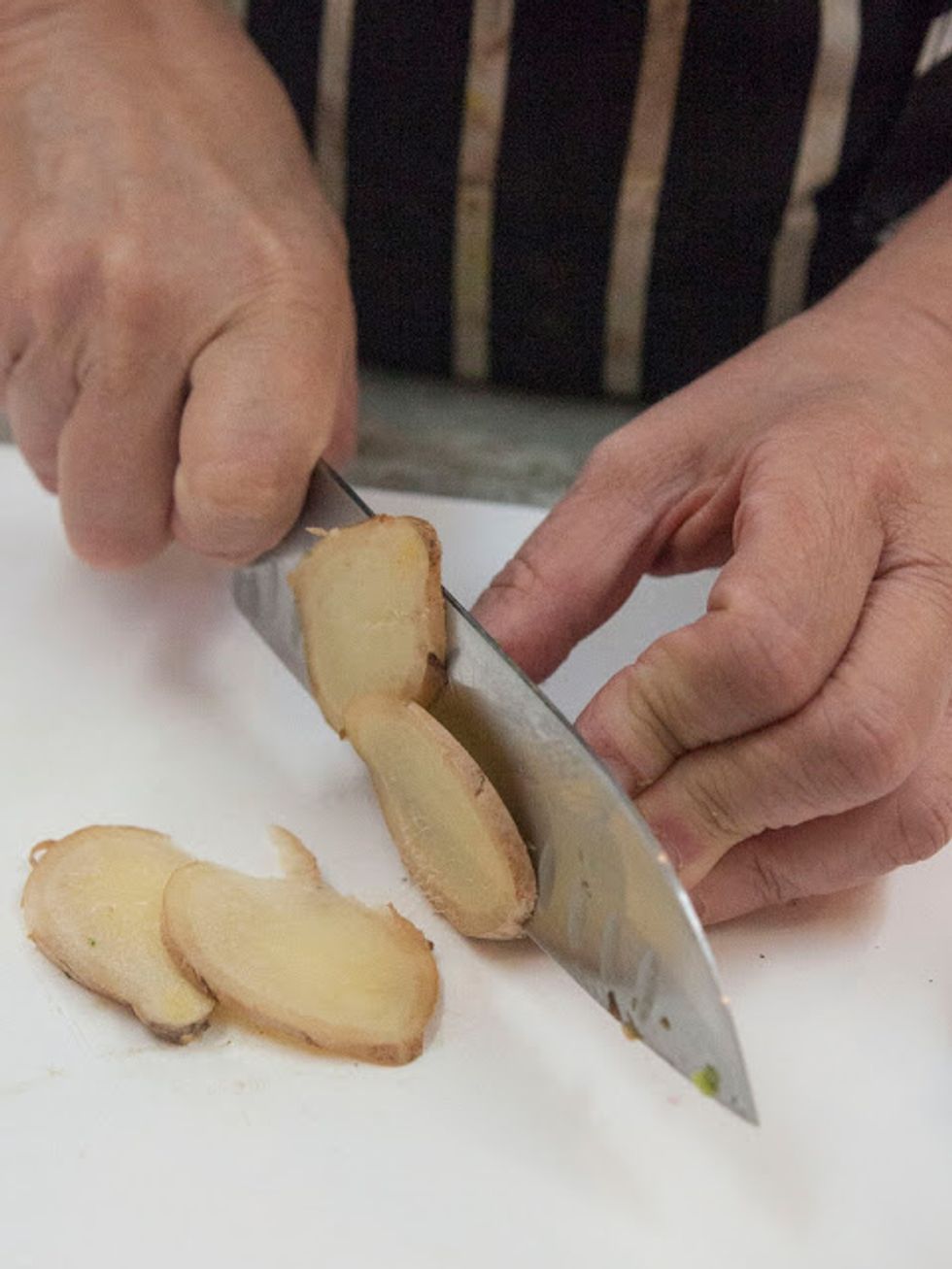 Peel and thinly slice some fresh ginger. You want 6 thin slices.