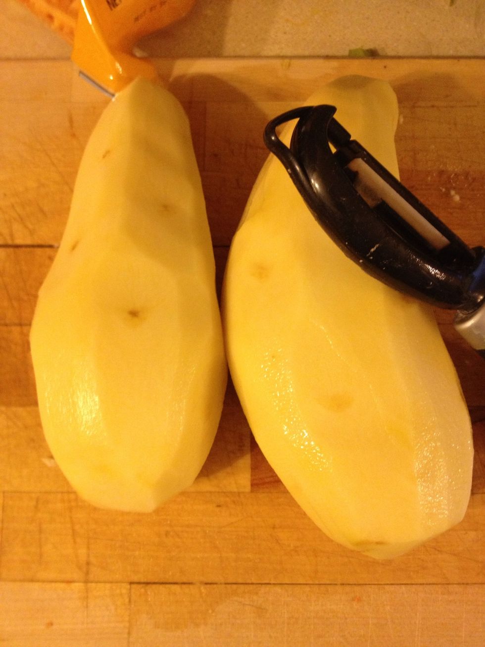 Peel and wash two large potatoes.