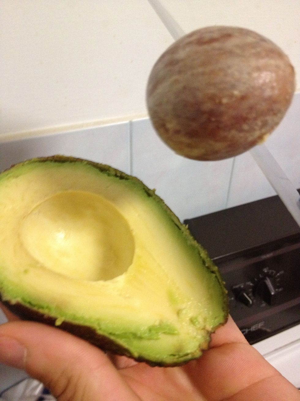Peel avocados and remove the pit.