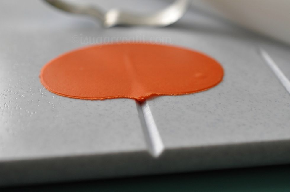 Peel away excess paste and remove cutter.