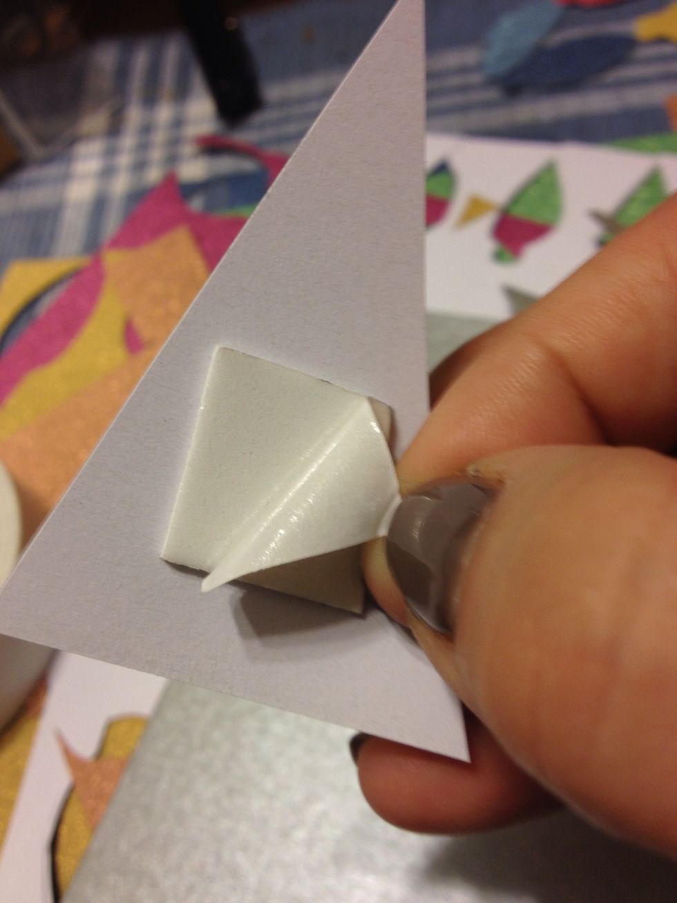 Peel back the film and place on the outside of the blank card