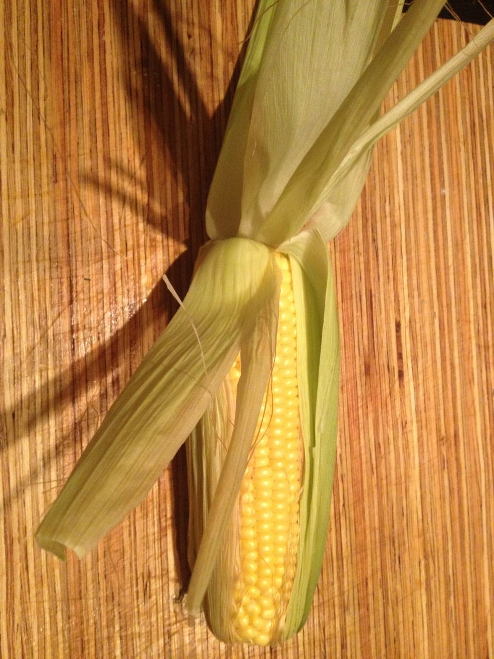 Peel back the husk on only one side