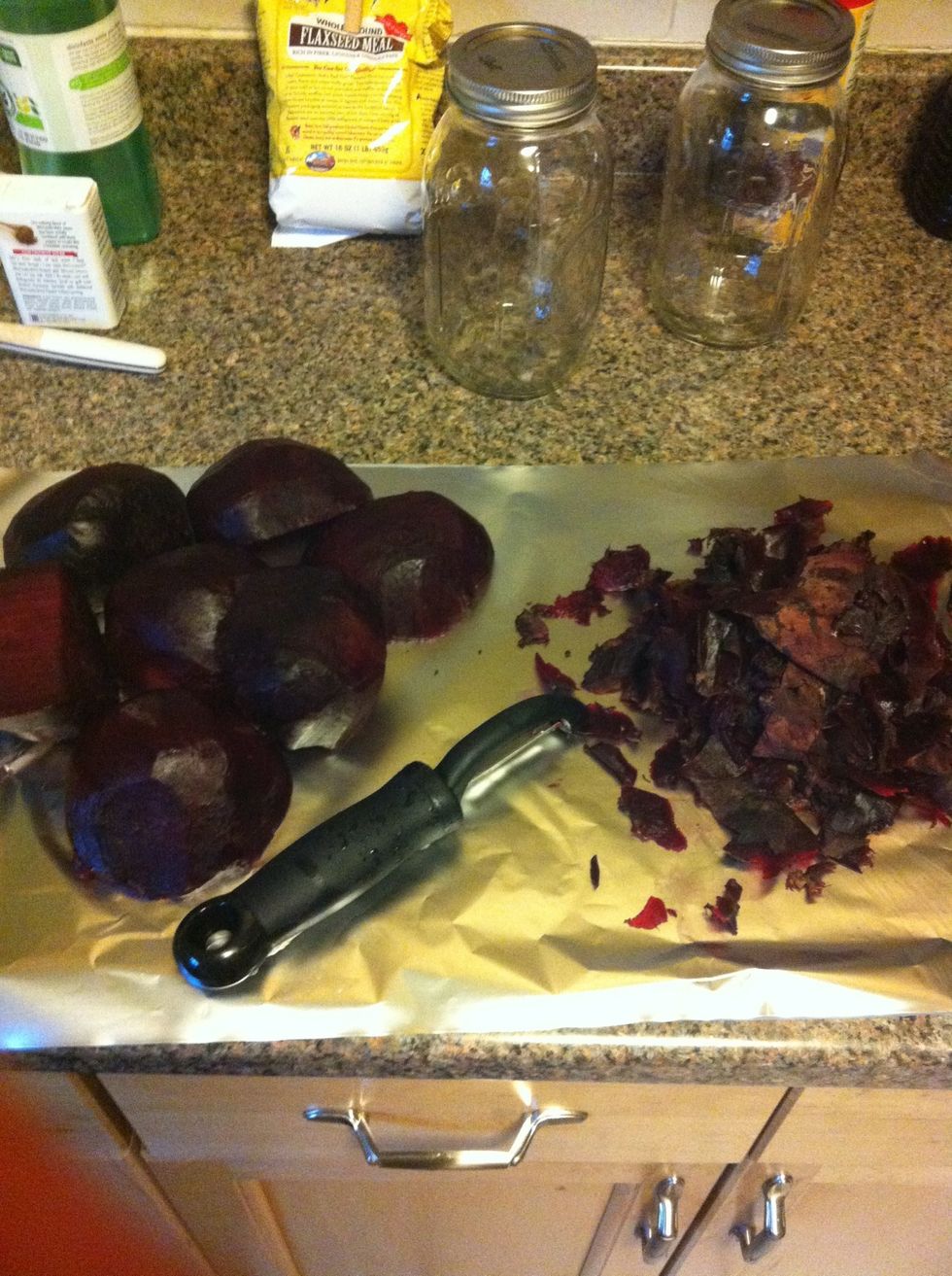 Peel beets. I put foil Over cutting board to prevent staining. Will come off hands but not clothes!