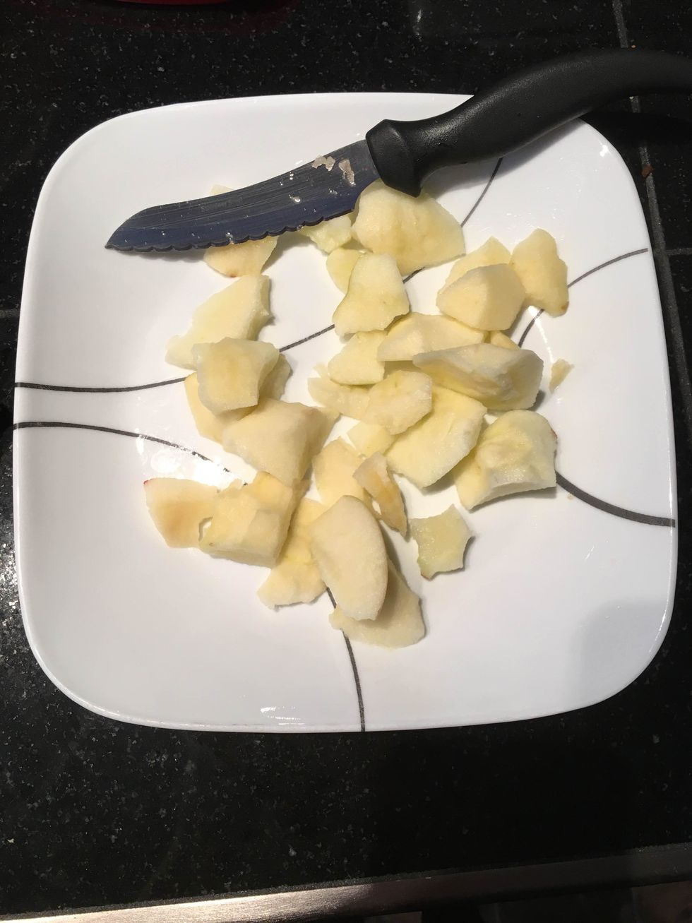 Peel, core, and cut up the apple.