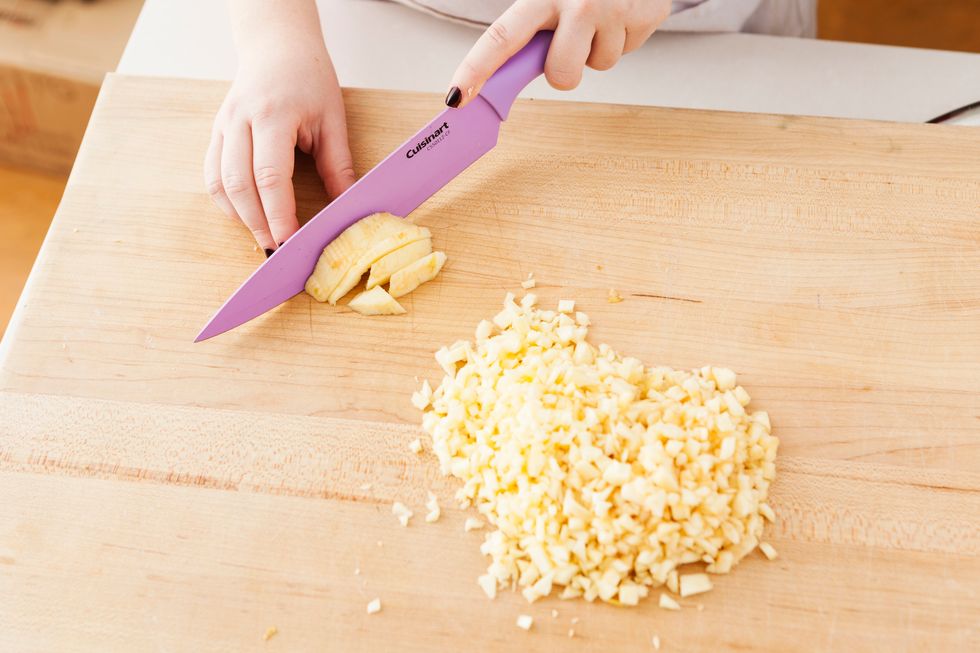 Peel, core and finely chop your quince.