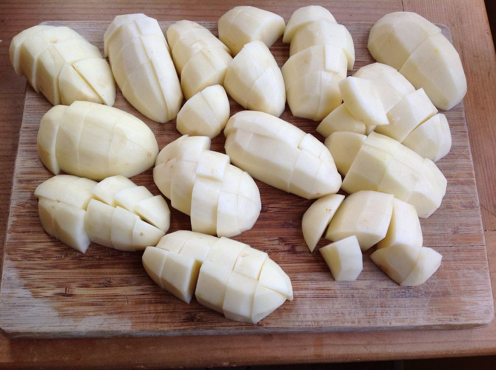 Peel, halve and cube potatoes. Keep uniform - they will cook evenly. 1" cubes is a good target size.