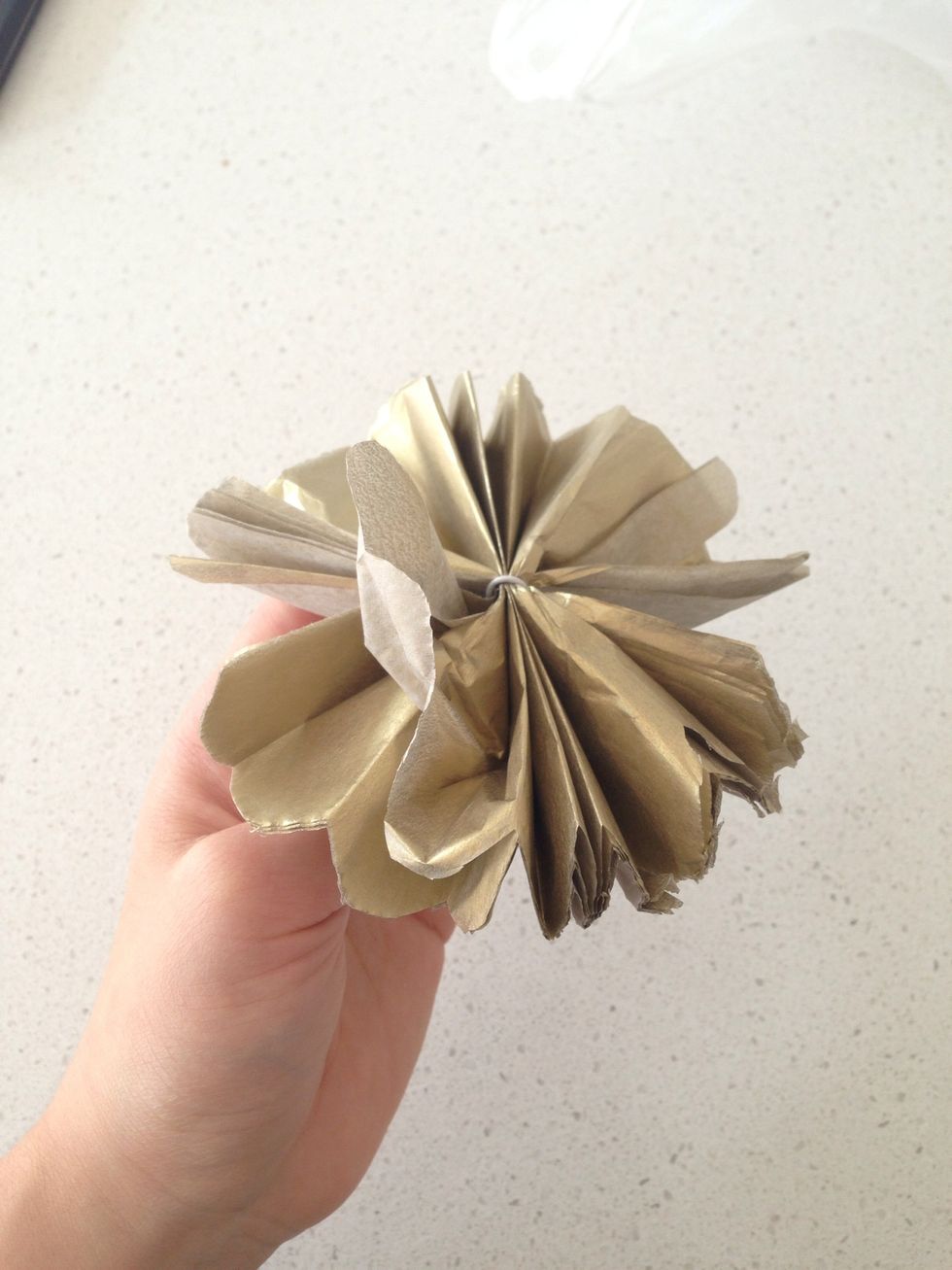 Peel it towards the middle sheet by sheet.