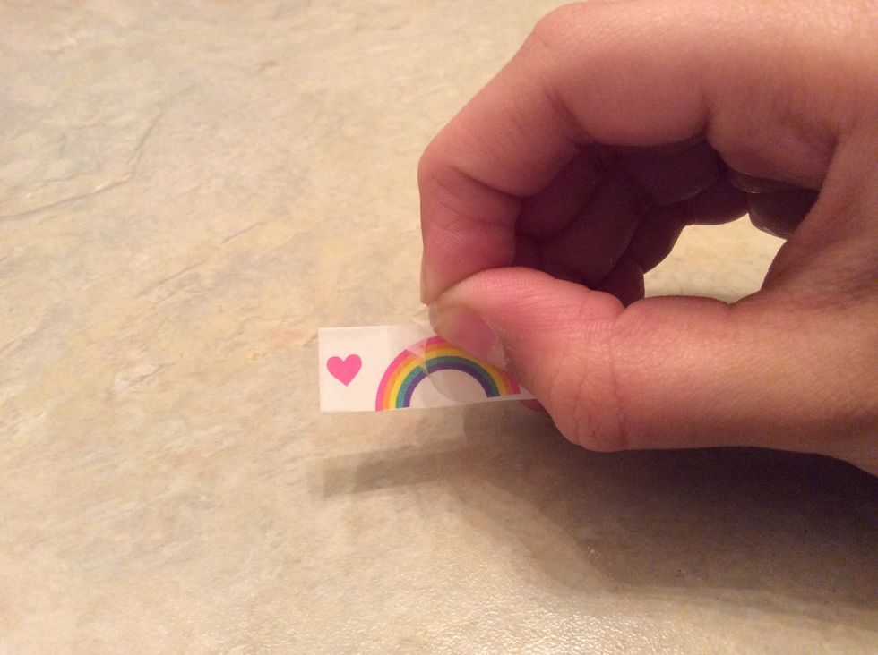 Peel of the plastic on the tattoo.