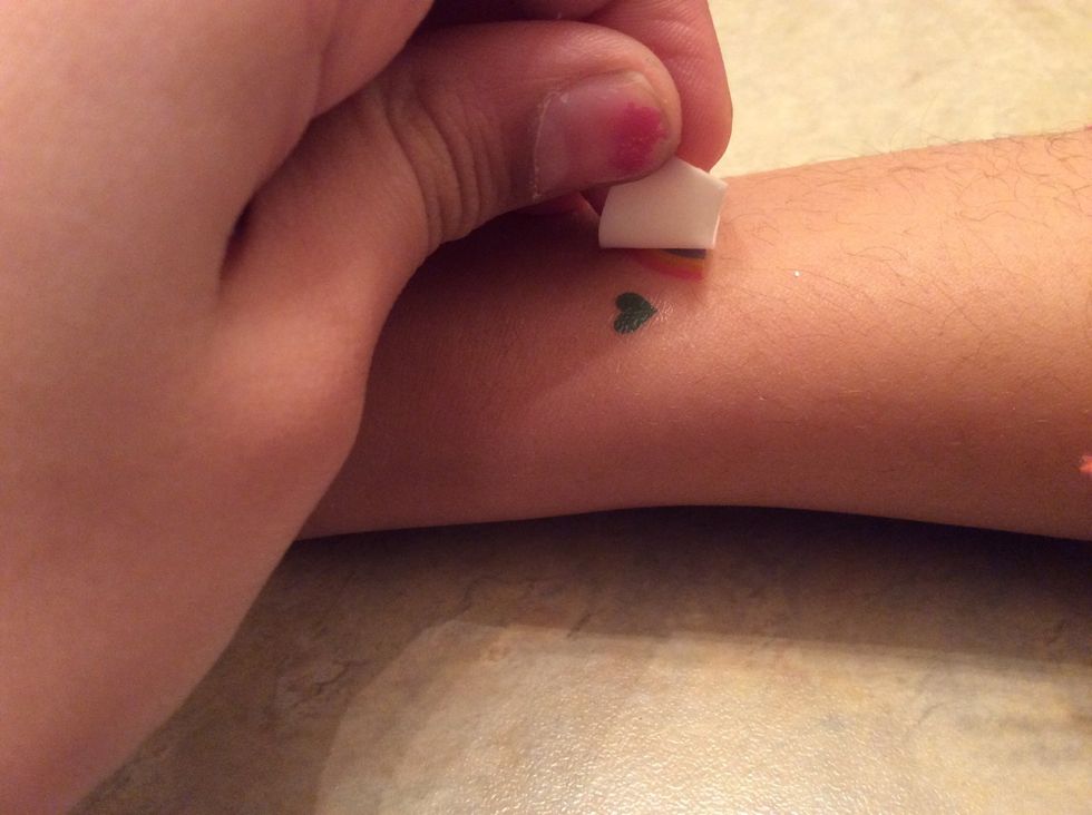 Peel of the tattoo print.