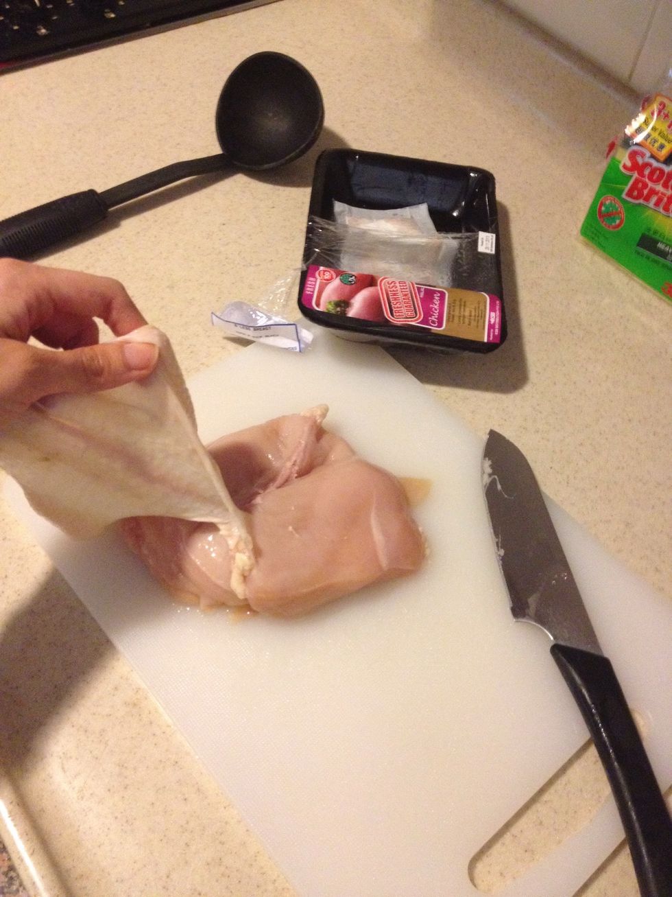 Peel off and discard the skin. The easiest way is to peel from the left and right. The back bone part is a bit harder to pull, cut with knife as you go.