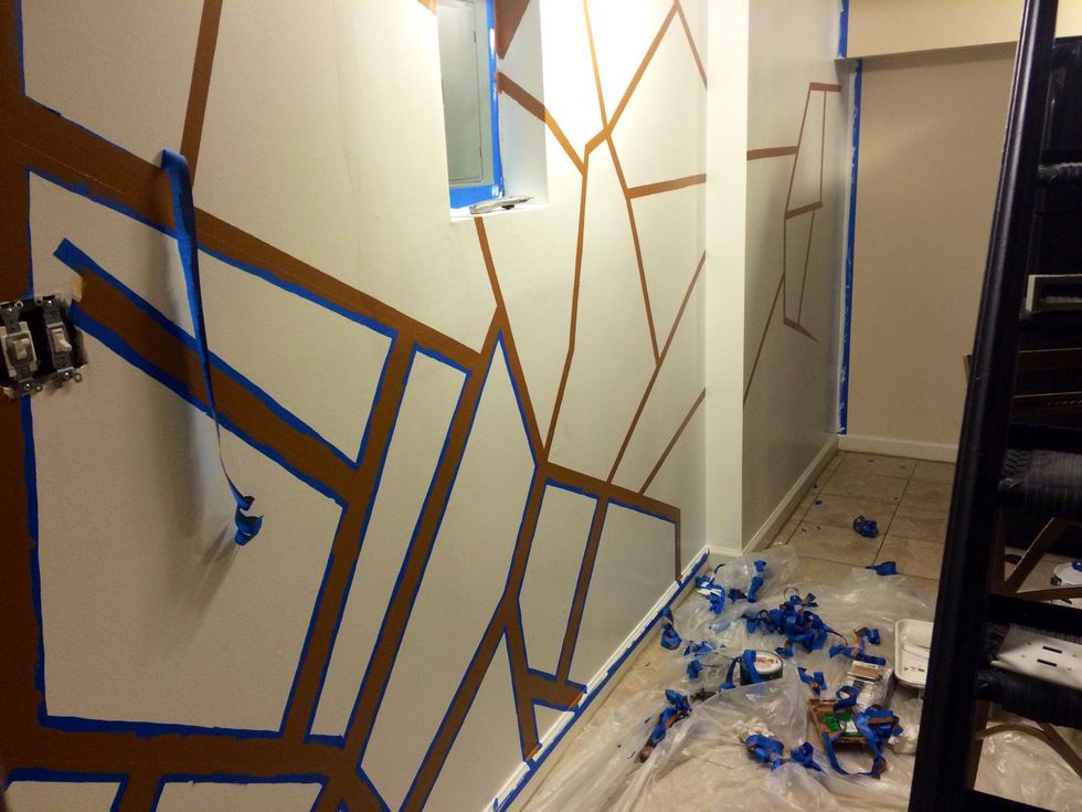 Peel off tape slowly and use a blade for the corners if the paint is hard