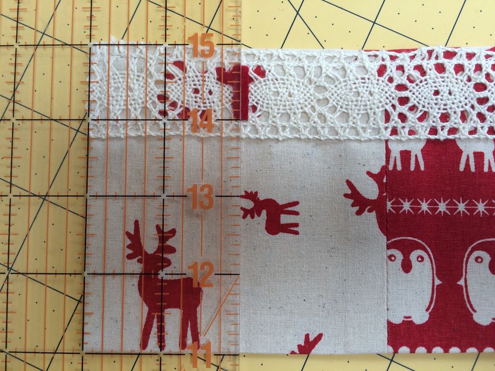 Peel off the paper from the back of the number . Centralise the number on the lace strip and on each pocket and press in position.
