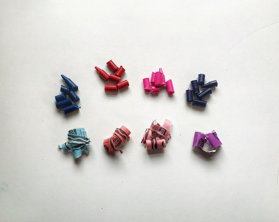 Peel off the wrappers of the crayons selected. Cut the crayons into smaller pieces for easier melting.