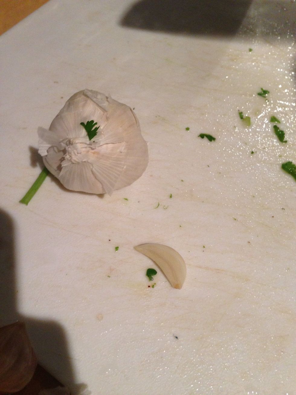 Peel one clove, if you like garlic you can add more later to taste