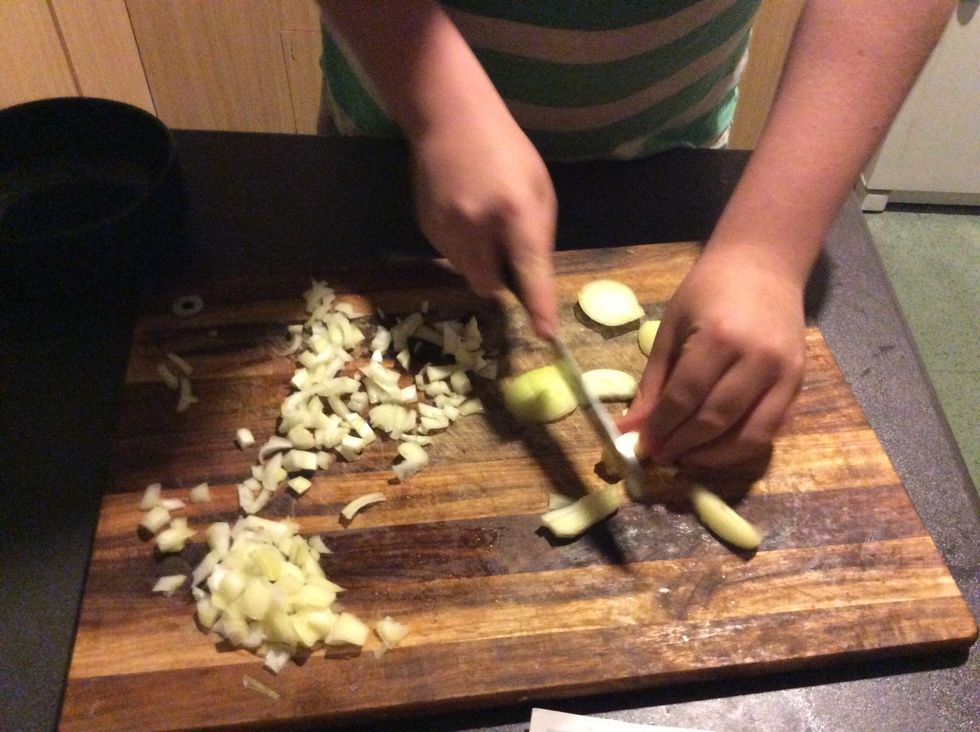 Peel onion and garlic clove and dice