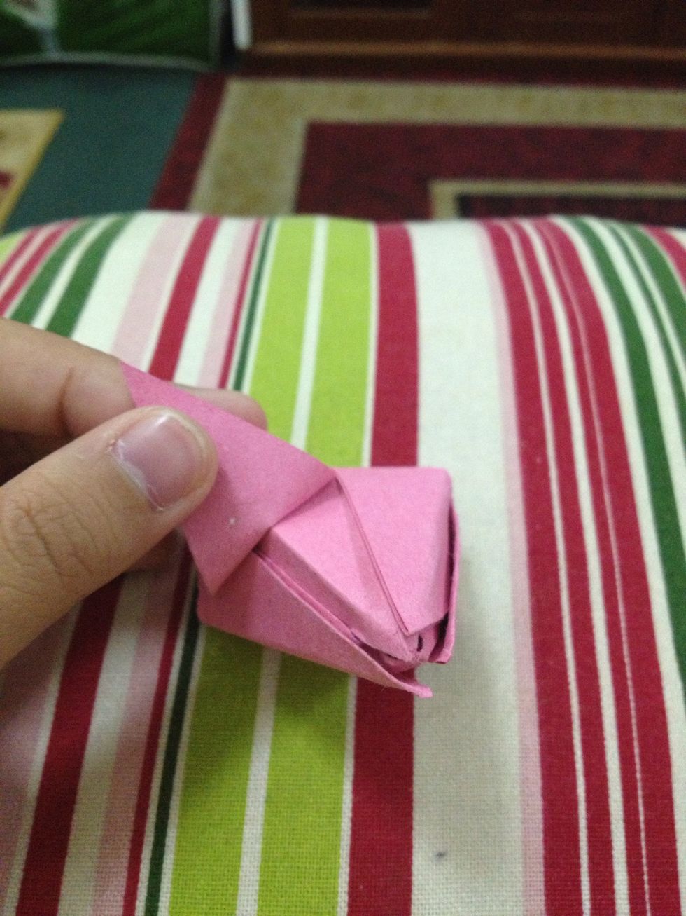 Peel or should I say unfold the petals. Don't go too far. Do the same with the remaining three petals.