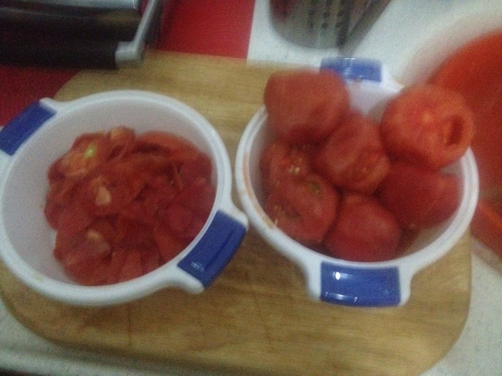 Peel our tomatoes over a bowl so you catch all of the juice