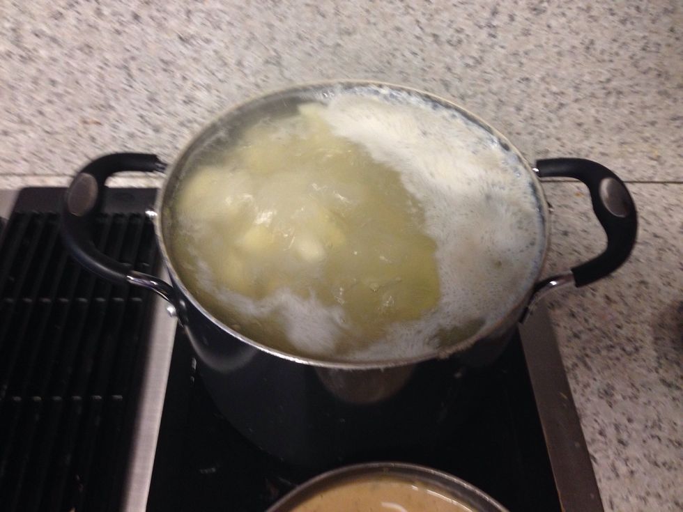 Peel potatoes and boil them until tender.