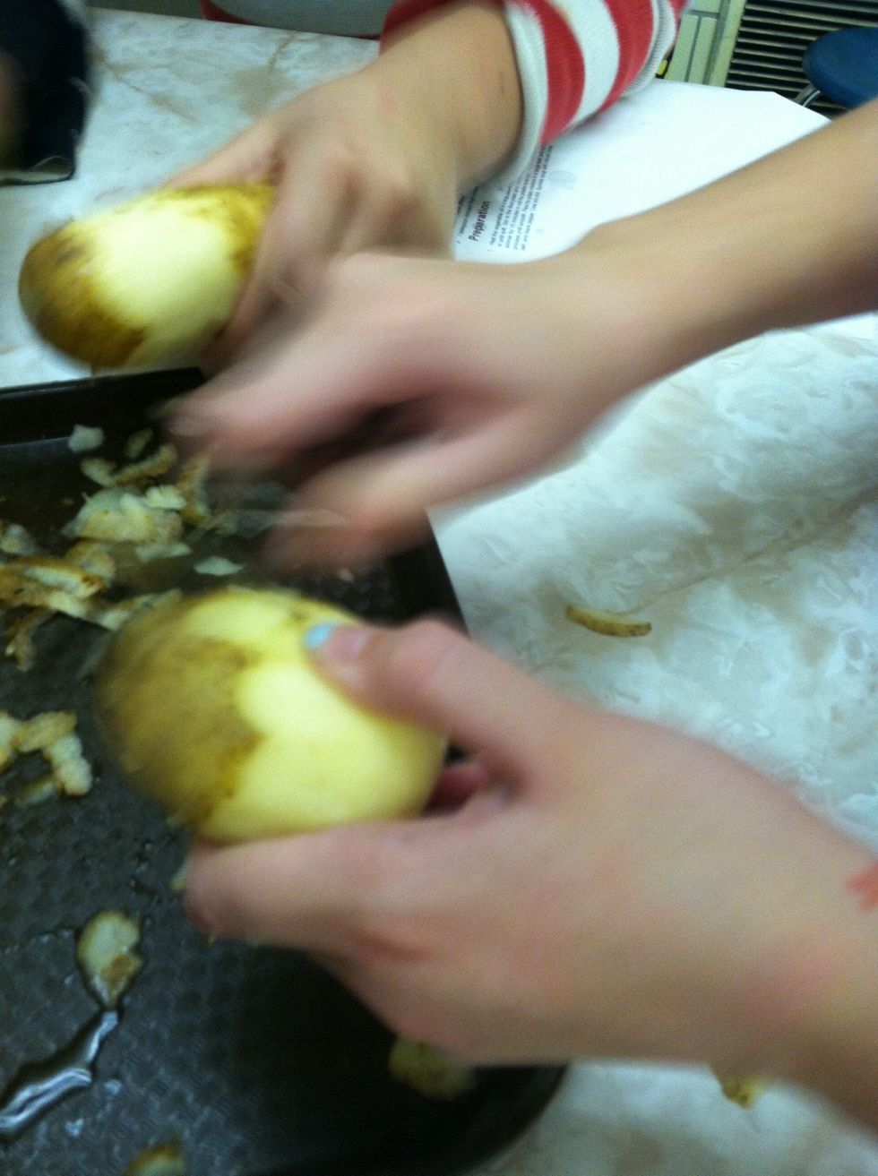 Peel potatoes