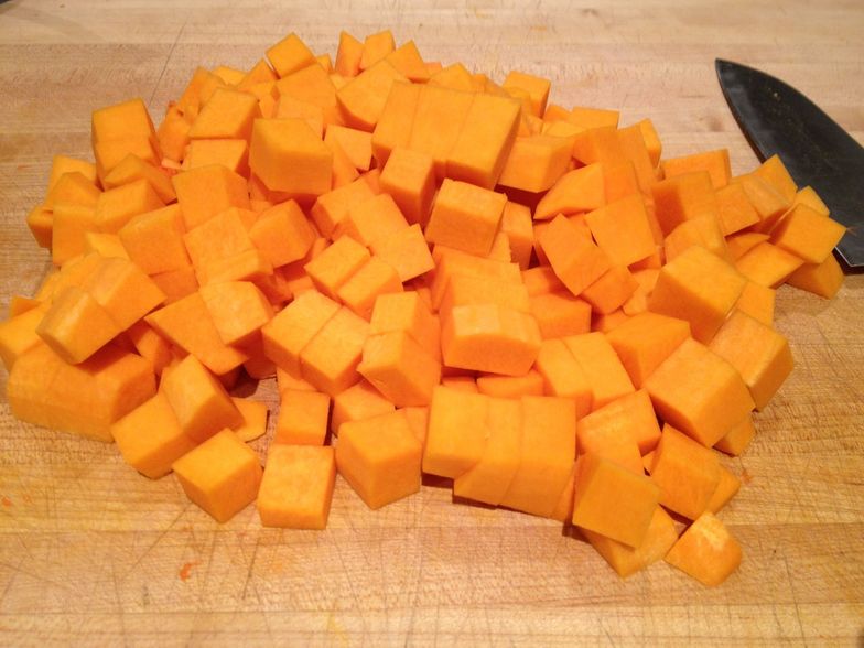 https://guides.brit.co/media-library/peel-seed-and-dice-the-squash-the-dice-should-be-so-rather-small-about-1-2-inch-cubes.jpg?id=24299228&width=784&quality=85