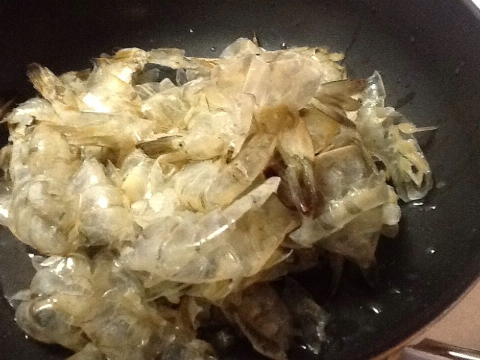 Peel shrimp and reserve the peels.