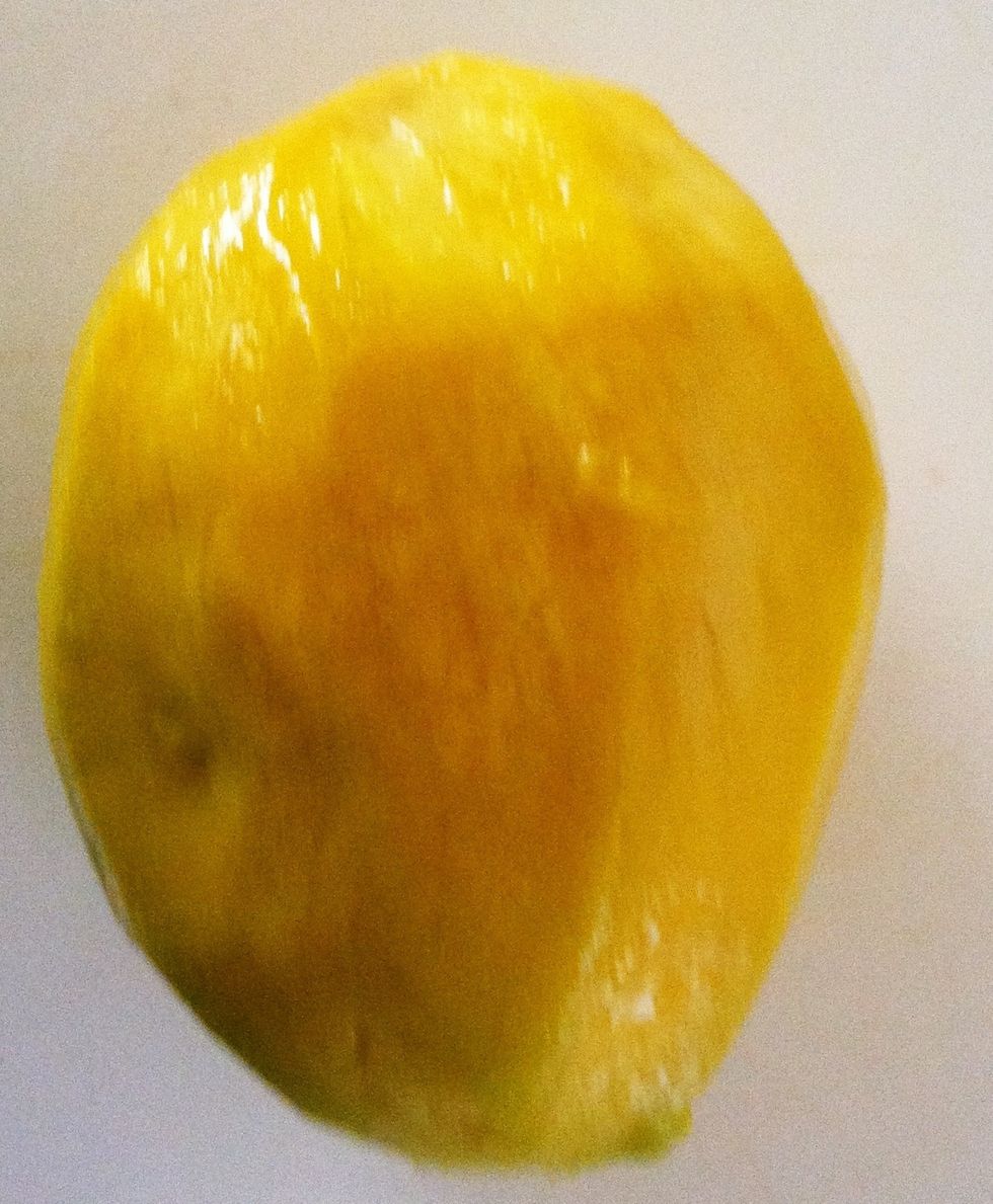 Peel skin from fruit in thin strips. Some recipes instruct to cut the fruit and then remove the skin but that method causes waste.