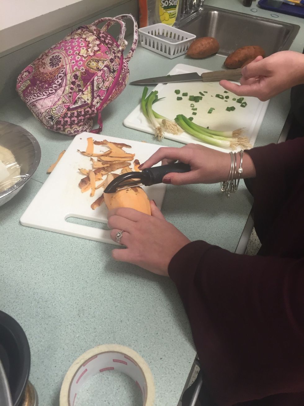 Peel the 4 sweet potatoes