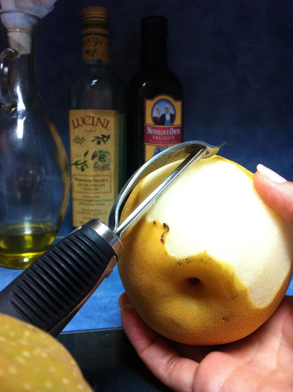 Peel the Asian pears fully.