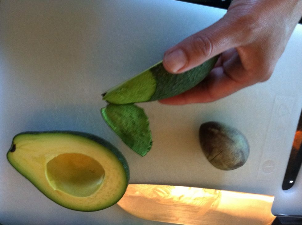 Peel the avocado, if the skin comes off easily.