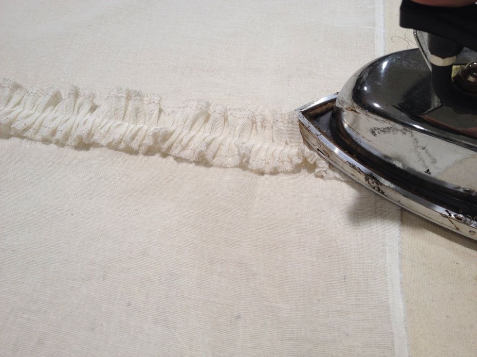 Peel the backing off the Steam-a-Seam and press the ruffling along each line.