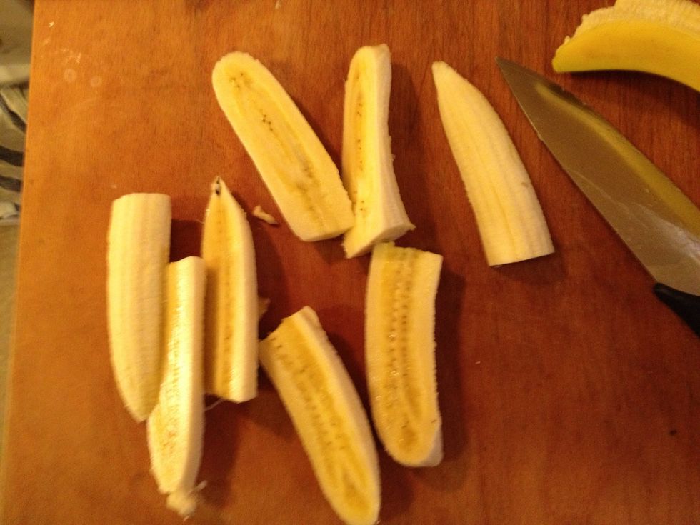 Peel the bananas and slice them like this.