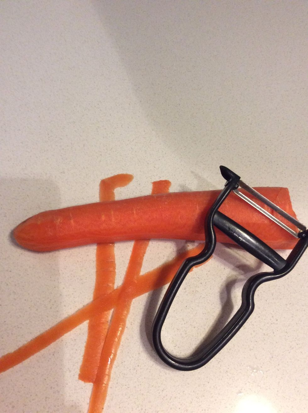 Peel the carrots.